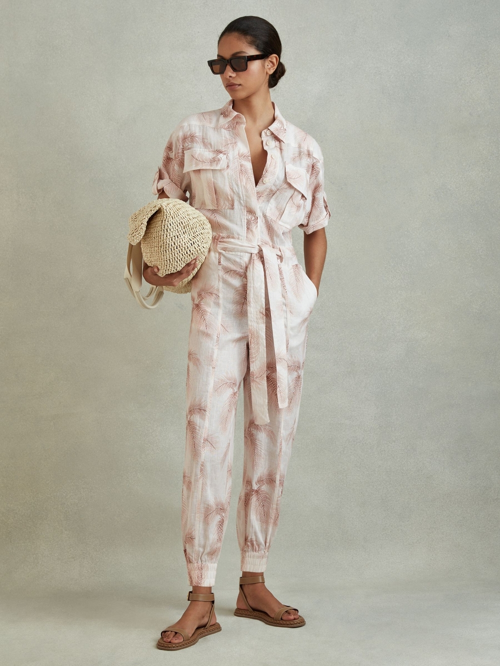 Reiss Kaia Linen Tropical Print Belted Jumpsuit in Blush
